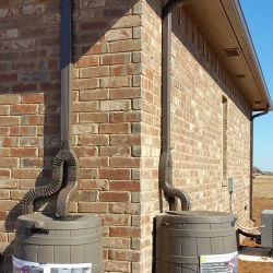 Downspouts Connected to Rain Barrel